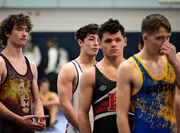 Through his father's death and battle with leukemia, wrestler Aidan  Halloran never gave up