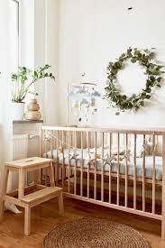 17 Greenery Baby Nursery Ideas So Pretty And Fresh Wooden Baby Crib Baby Cribs Baby Nursery Decor