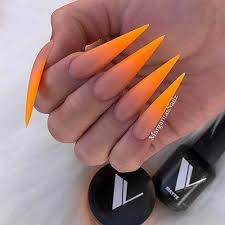 The stiletto nails come to a distinct point at the top and could poke an eye out if they needed to. 21 Best Neon Orange Nails For Summer To Enjoy 2020