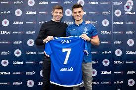 In 2003 five stars were added to the scroll crest, one for every ten titles won. Ianis Hagi Joins Steven Gerrard S Rangers Besoccer