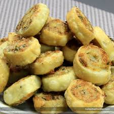 Aloo Bhakarwadi A Traditional Recipe From Maharashtra And Gujarat Can Be Prepared As A Snack Recipe In English Recipes Easy Snack Recipes Pinwheel Recipes