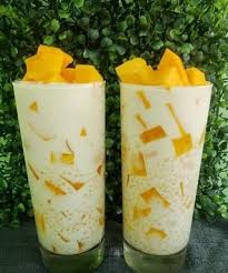 Masukkan susu cair, lalu aduk hingga rata. Minuman Air Mangga Manisan Segar Ohh Nyamannya