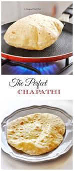 A Very Soft And Puffed Up Indian Flat Bread Chapathi Serve With Indian Curry Main Dishes Or Even Use It To Mak Indian Food Recipes Recipes Indian Flat Bread