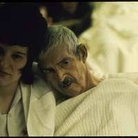 1st Lieutenant Phyllis Hocking adjusts glucose injection apparatus for a GI  patient in the 36th Evac. Hospital, Palo...