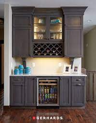 Dynesty Omega Cabinets With Wine Rack And Small Lighted Cabinet Accents Gerhardsstore Omegaca Kitchen Cabinet Wine Rack Wine Cabinet Furniture Kitchen Remodel