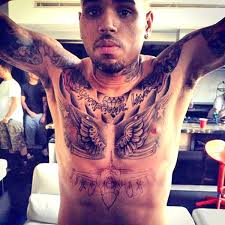 Tattoo designs for ur plesure. Pics Chris Brown Gets New Tattoo In Same Spot As Rihanna Hollywood Life