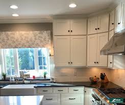 High Ceilings No Problem The Separate Door Near The Top Of These Cabinets Provides Additional Storage While Allowi Kitchen Cabinetry Custom Kitchen Kitchen