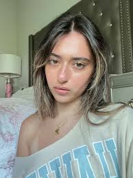 Melody Miles Feather Hair