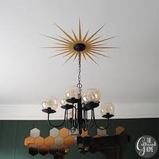 Making our own custom ceiling medallion was an easy way to add character to our living room and infuse our home with more of our style and personality—but in a simple way. Diy Sunburst Ceiling Medallion Ikea Honefoss Mirrors Ceiling Medallions Modern Ceiling Medallions Dining Room Ceiling