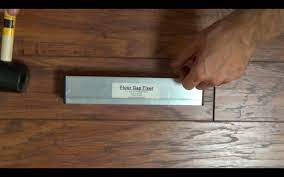 Fix Gaps In Your Laminate Floors Fast And Easy Floor Gap Fixer Instruc Floating Floor Flooring Refinishing Floors