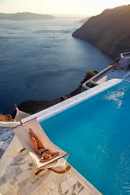 Chic interiors, views onto the vineyards, 10 minutes from the best black beaches in santorini and just a 30 minute walk from oia with private parking. These 9 Hotels Have The Best Views In Santorini