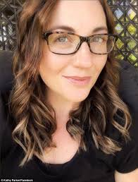 Kathy Parker's Australian farmer husband herds sheep into a love heart