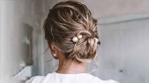 You actually start with the bottom and twist all the short pieces up and pin them. 21 Easy Updos For Short Hair Cute Bun Updo Ideas L Oreal Paris