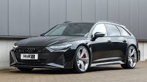 The rs 6 avant rs tribute edition pays homage to the rs 2 with its silver wheels, black roof rails, nogaro blue exterior paint, body color mirrors, red brake calipers, rs sport exhaust, black optic package, and a variety of audi exclusive interior finishes. 2020 Audi Rs6 Avant By H R Rides Low For Better Handling