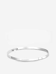 Chaumet bracelet in 18 carat yellow gold and 13 ruby jewels in the center of each link set with a claw. Liens Evidence 18ct White Gold And Diamond Bracelet Hushhush Com