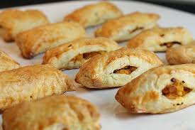 Fold short side over filling; Haitian Chicken Puffs First Look Then Cook