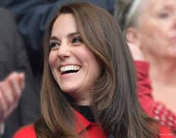 Kate repeats red Carolina Herrera coat for the France vs. Wales Rugby Match  in Paris