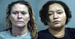 Two women accused of burglarizing several units at Louisville storage  facility