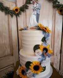 Price without bride and groom topper £220.00 colours & flowers can be made to your requirements. Tall Layered Two Tier Buttercream Wedding Cake With Cascading Flowers Vegan Picture Of City Cakes Cafe Salt Lake City Tripadvisor