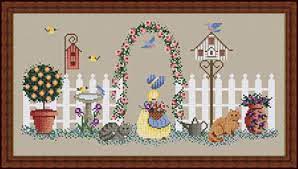 This pattern is in black and white and uses symbols to differentiate the different threads you will use. Whispered By The Wind Becky S Garden Flowers Bluebird Bird House Cats White Picket Fence Bird Bath Little Girl Yellow Dress Sunbonnet Tree Cross Stitch Pattern