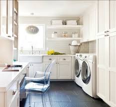 This laundry room design incorporates elements of a home office, craft room and sitting room. Remodelaholic 20 Large Multi Purpose Laundry Rooms