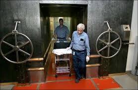 As of 2019, the vault housed approximately 497,000 bars of gold, weighing about 6,190 short. New York Architecture Images Federal Reserve Bank Of New York