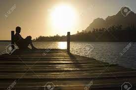 Posted by wes on 16 july 2009, 6:51 pm. Man Sitting On Dock By Lake Side View Stock Photo Picture And Royalty Free Image Image 19521667