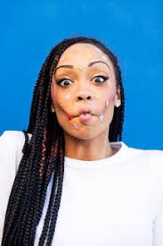 Mujer joven con pegatinas en forma de estrella en la cara stock photo