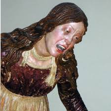 A life-size, terracotta (a type of earthenware) sculpture group shows seven  biblical figures gathered around the dead body of Jesus Christ. Created in  the 1480s for Duke Ercole d'Este of Ferrara, Guido