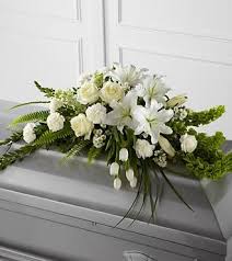 It's also a good idea to opt for an arrangement that is either traditional or conservative in style. Flowers Arrangements Funeral Casket Sprays 27 Ideas