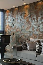 An Aged Metal Accent Wall Brings Industrial Esthetics To The Living Room Stone Walls Interior Wall Cladding Interior Stone Cladding Interior