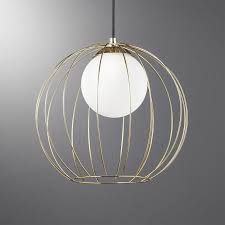 A modern update to one of our most beloved fixtures. Cage Brass Globe Pendant Light