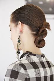 Grab a portion of hair from the right side of the head and twist it; Hairstyles You Can Do With One Hair Tie Easy Hair Ideas Spring 2015