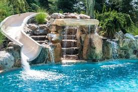 This elevated swimming pool looks out upon a real tropical jungle to create the perfect backdrop for an exotic escape. 36 Luxury Pools Slides Ideas Luxury Pools Backyard Pool Pool Landscaping