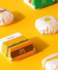 Please put the country in brackets like this: Mcdonald S Unveils Global Packaging Redesign With A Focus On Graphics