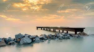 The largest family name in the village is known as 'heng'(王) in teochew dialect. Beautiful Sunset View Over Calm Water Of An Abandoned Jetty In Stock Photo Picture And Royalty Free Image Image 35895081