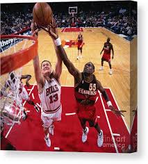 He appeared in three summer olympic games (1988, 1992 and 2000) as well as at the 1990 fiba world championship. Luc Longley And Dikembe Mutombo Canvas Print Canvas Art By Glenn James