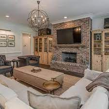 New Snap Shots Brick Fireplace Living Room Popular A Brick Fireplace Could Be A Gorgeous Focal Point In A In 2021 Brick Living Room Living Room Remodel Living Room Red