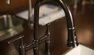 How To Paint A Stainless Steel Sink Hunker Oil Rubbed Bronze Light Fixtures Oil Rubbed Bronze Faucet Bronze Faucet