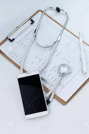 mobile phone stethoscope and chart file on the desktop mobile