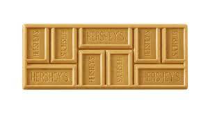 Labeled as a caramelized creme bar, hershey's gold is essentially a white crème that's been cooked until it's golden in color and tastes slightly like caramel (hence the name). Hershey S Erste Neue Bar In Uber 20 Jahren Und Es Ist Nicht Einmal Schokolade