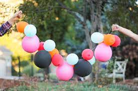 1) blow 2 balloons (about 20cm) and tie tails. 6 Super Easy Balloon Decoration Ideas For Birthday Parties The Urban Guide