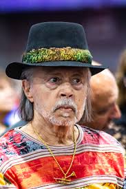 Helen Simpson took this photo of Chuck and me, the last professional photo  we had taken , 2005, I think and displayed it in the window