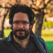 Meet Joe Tucker, who provided musical entertainment for the Forest School  District luncheon before the holidays began. Joe is from the FHS Class of  1973. He played trumpet in the Pride of