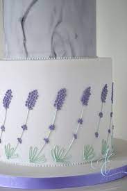 Wedding Cake Decorated With Lavender Marble And Watercolour Speckles Reflecting The Coastal Flo Wedding Cake Decorations Lavender Cake Lavender Wedding Cake
