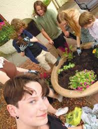 Downtown Milledgeville begins to bloom one planter at a time
