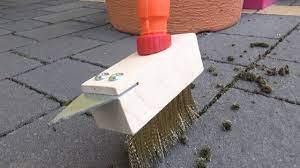 Combine a mixture of 1 part water and 1 part bleach into your spray bottle. How To Remove Moss From Paving Garden Tips Youtube