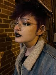 What songs should be included in a Monster High themed 2010s pop playlist?