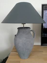 kruik bewerkt met muurvuller en verf van action lampenkap gekocht bij kringloop en geverfd met home deco van de action table lamp lamp home decor