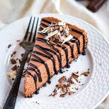 Easy No Bake Triple Chocolate Cheesecake The Busy Baker Recipe Triple Chocolate Cheesecake Baking Desserts